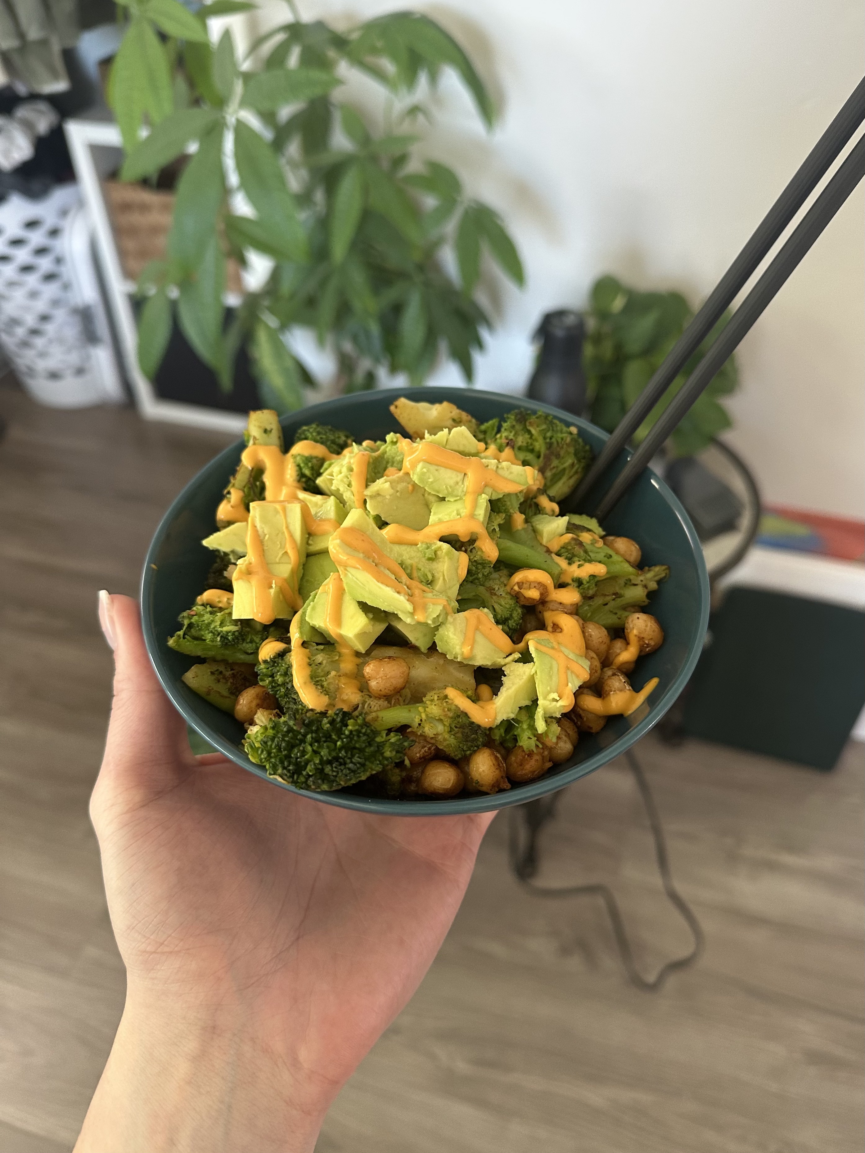 A rice bowl with chickpea, broccoli and avocado
